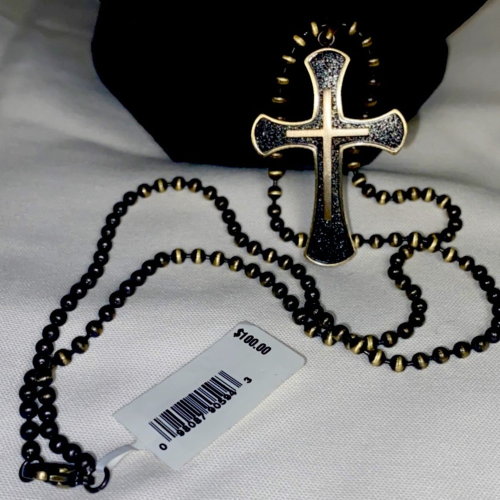 Cross necklace with a 22 inch chain.